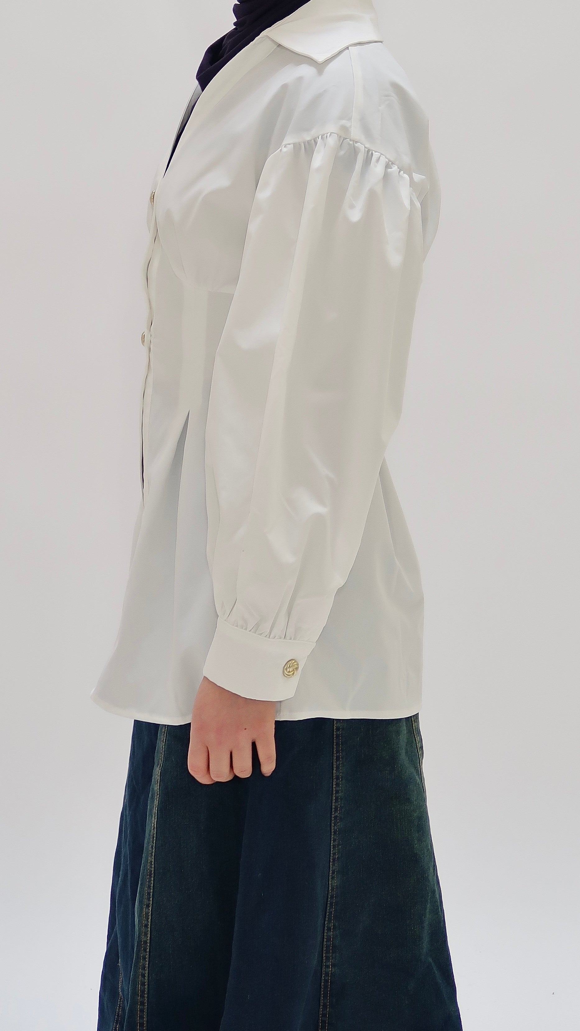 Shirt with gold buttons