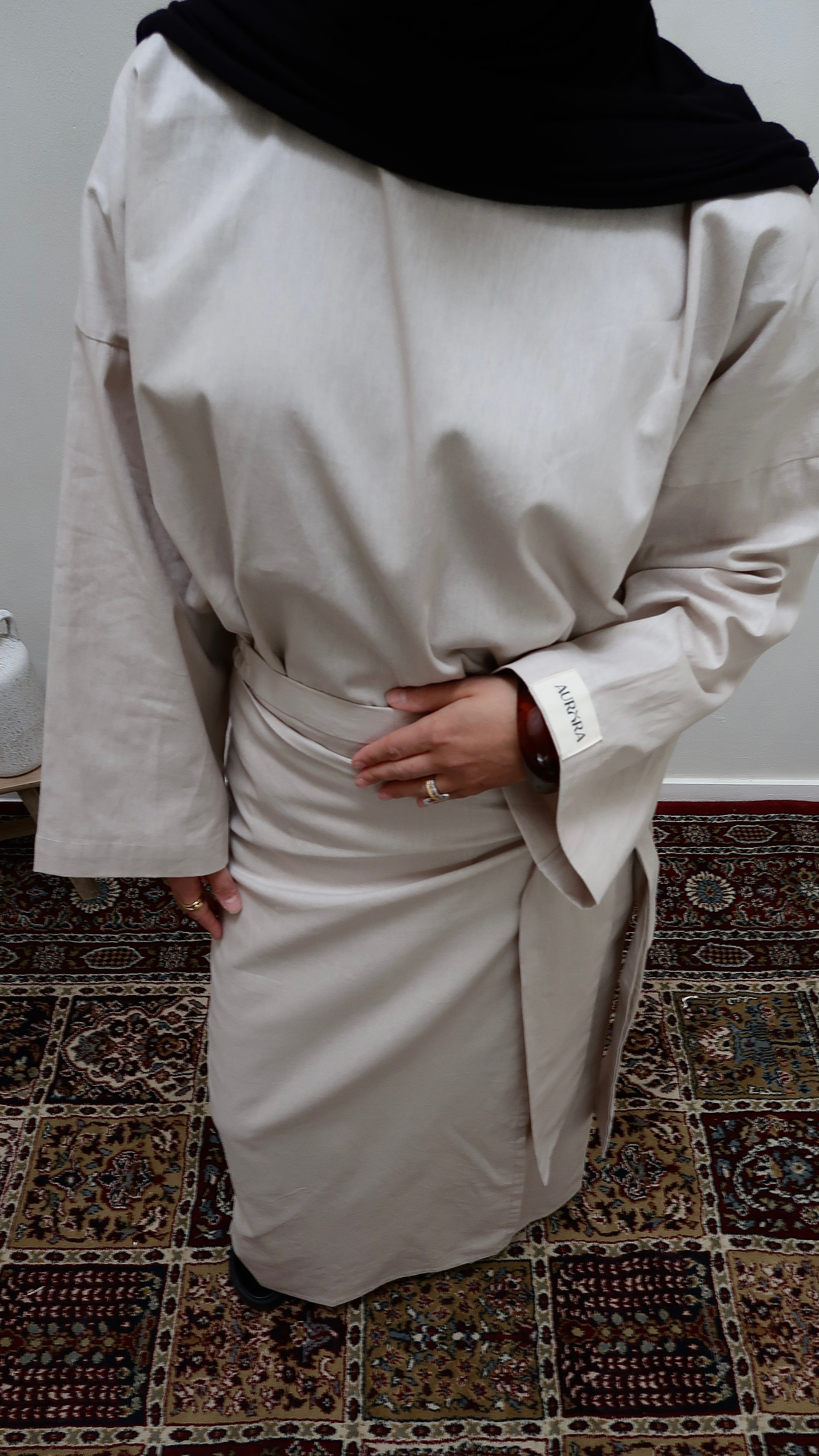 Two-piece with wrap skirt sand