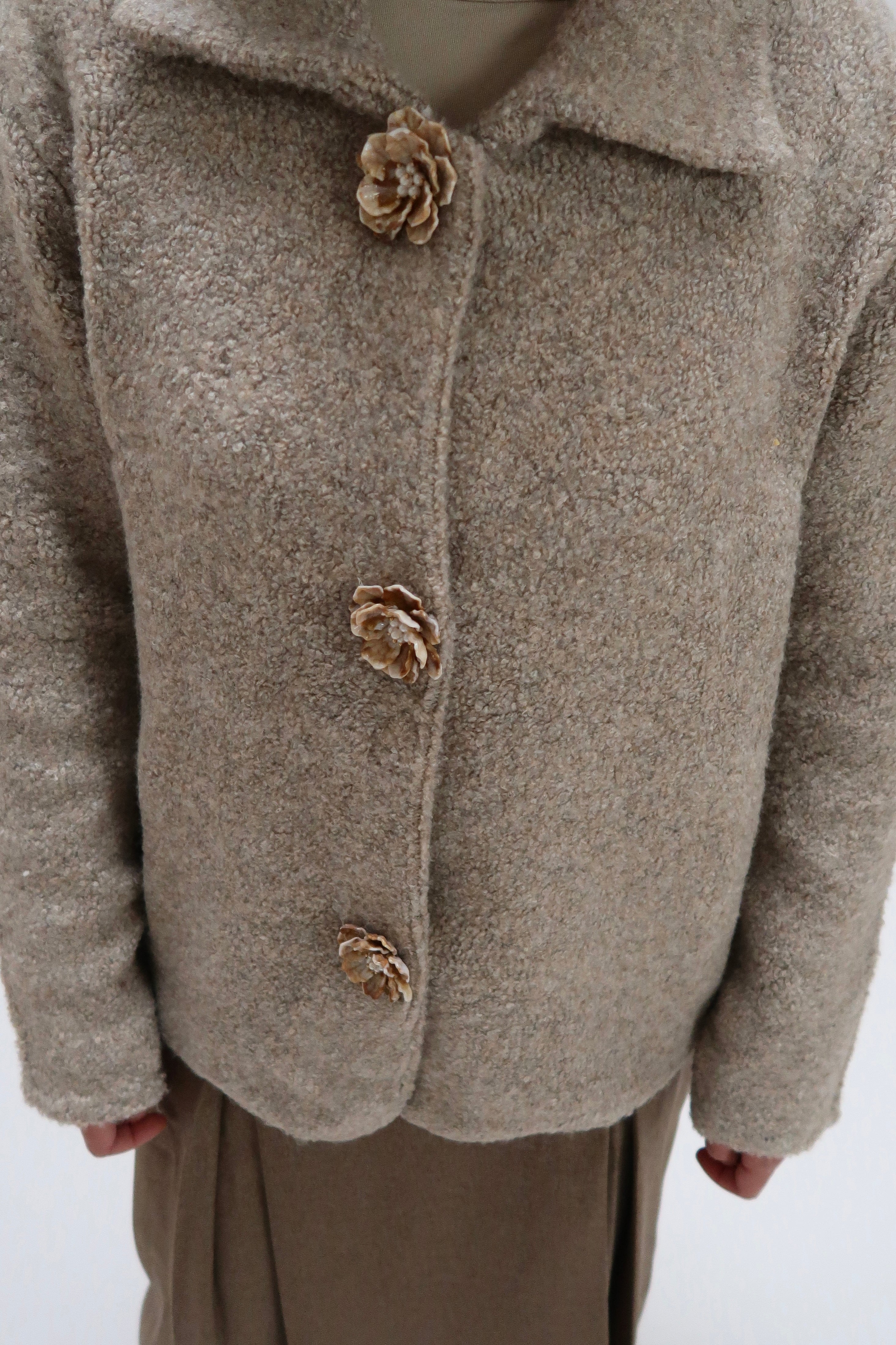 Transitional jacket with flower buttons
